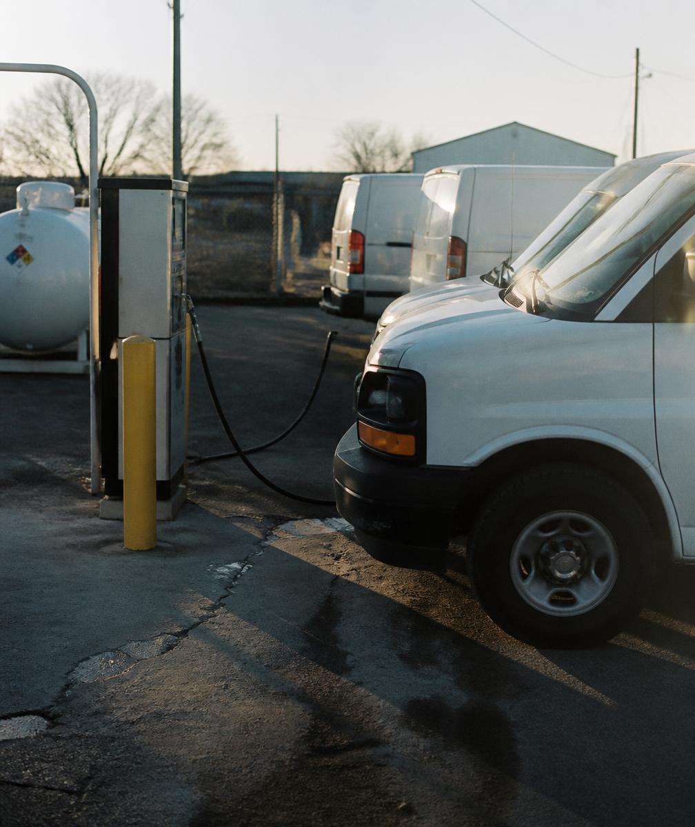 Work vans fueling at a propane AutoGas dispenser